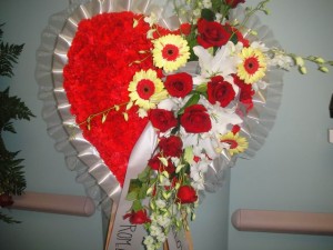Carnation Filled and Popping Yellow Daisies Heart Shape Spray 